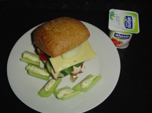 Roll with chicken, jarlsberg and cheesy celery