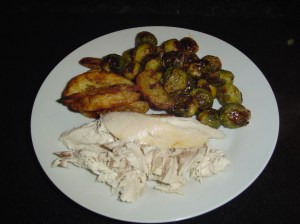 Roast Chicken, herby potato wedges and roasted brussels