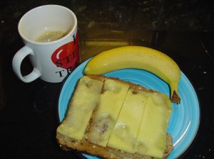 Breakfast 14/1/10 Cheesy Toast, Banana and Coffee